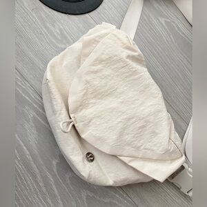 Lululemon Elegant Cream Cross Body Shoulder Water Bottle Bag